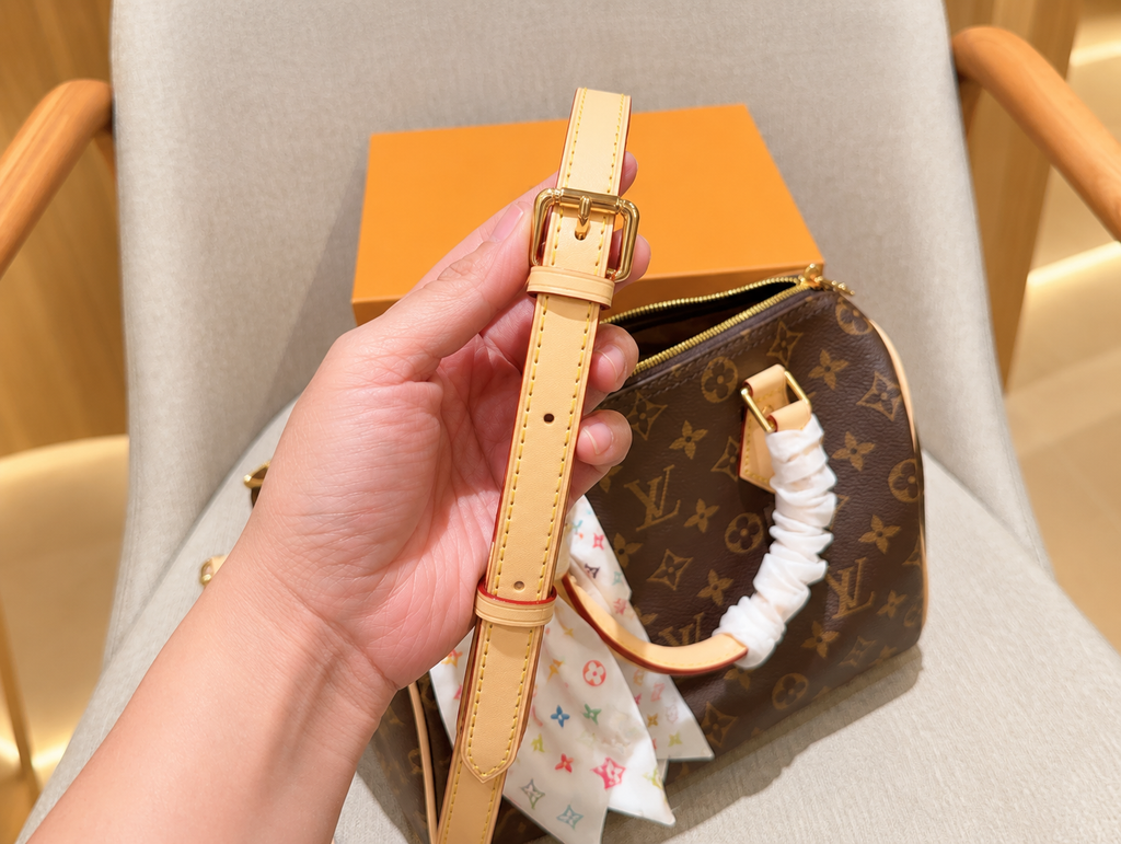 Louis Vuitton 25cm monogramme bandoulière réglable