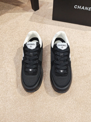 CHANEL Sneakers – Noir & Blanc